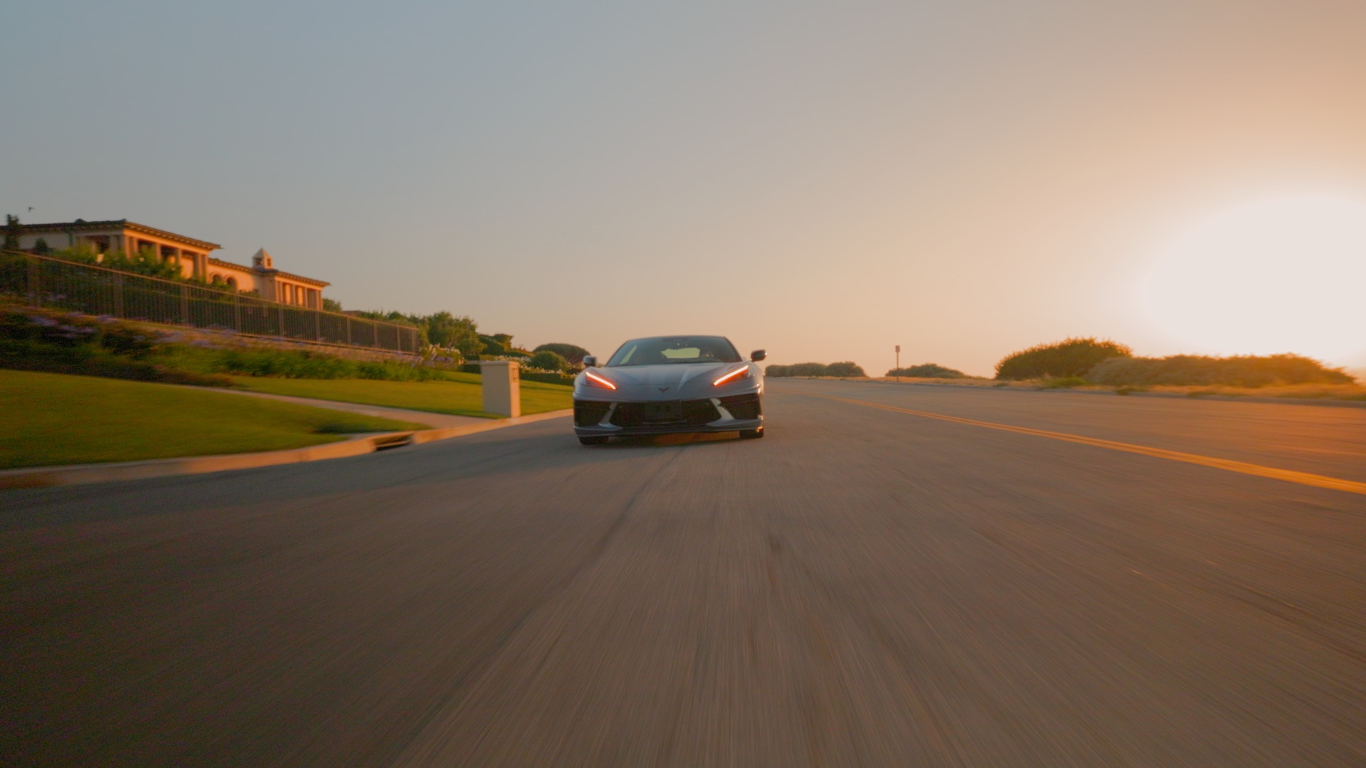 A Corvette at golden hour on a coastal road, graded in ColorPilot